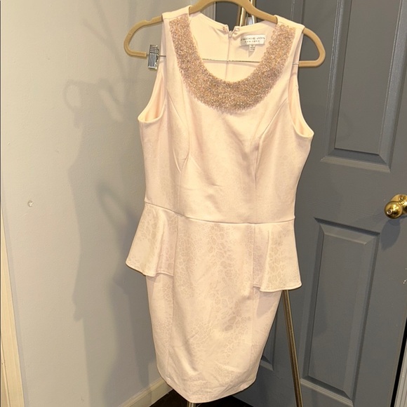 Blush colored Sleeveless peplum Dress. 
Worn once. - Picture 1 of 7